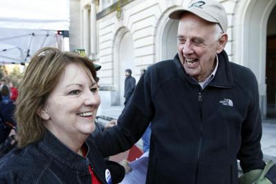 Wendell Berry, right, joins an 'I Love Mountains' rally against mountaintop mining at the Kentucky Capitol in 2013.