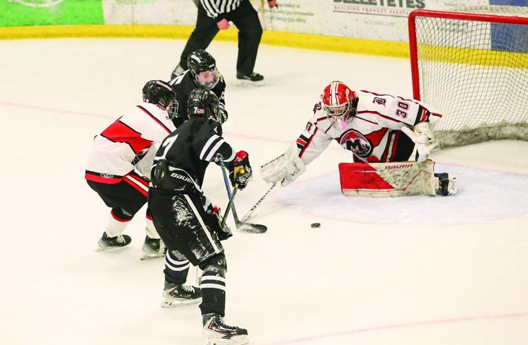 03-11-26 KHS-BG Frozen Four lane parsons at net 1