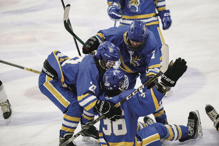 12-27-22 Peter Hall Xmas Tournament ice cats celebration after richard tight