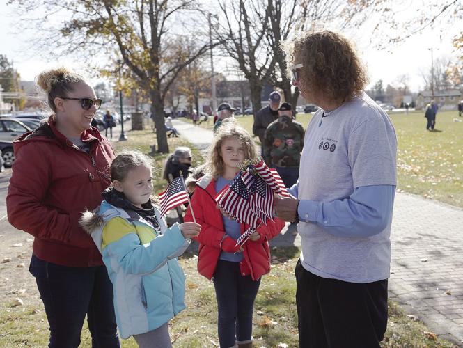 11-11-21 Veterans Day handing out flags