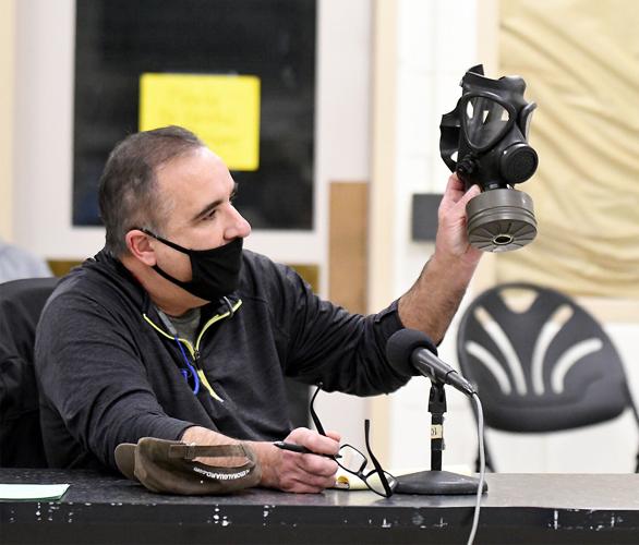 Conway School Board - Kevin Clifford with a gas mask