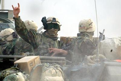 U.S. Marines crossing into Iraq from Kuwait on March 21, 2003.