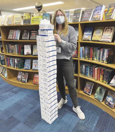 Pope Memorial Library Haley Torrey with masks