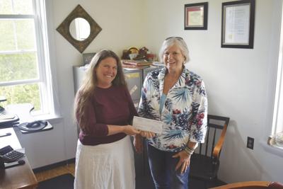 Lilli and Terry with County Check