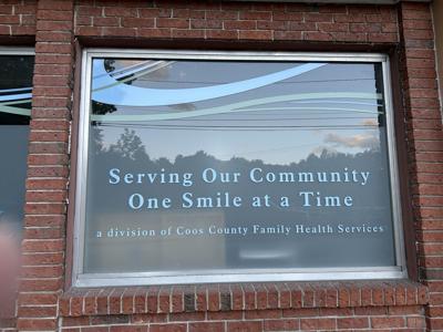Coos County Family Dental sign