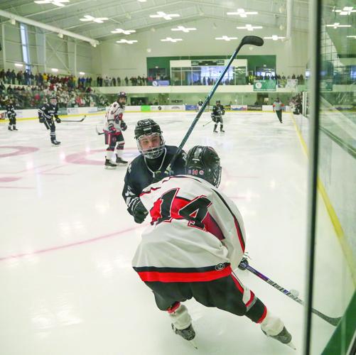 03-11-26 KHS-BG Frozen Four parsons croteau corner