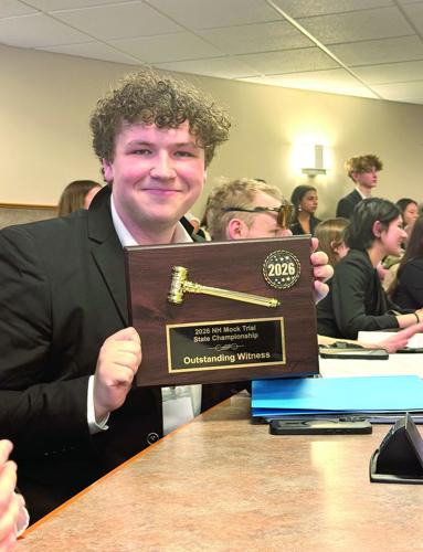KHS Mock Trail Team - Konnor Wolfe with award