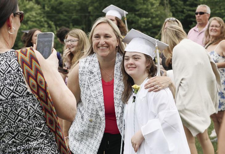 06-08-24 KHS Grad pose fougere and yahna