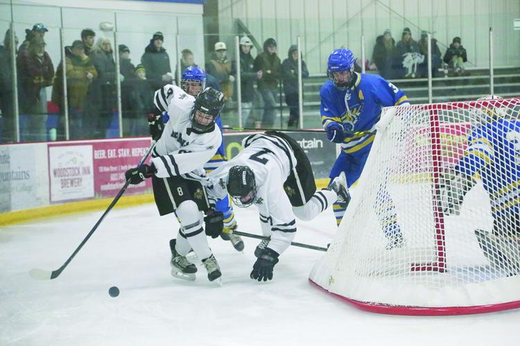 12-27-25 KHS-Maine Hockey lundblad behind net 1