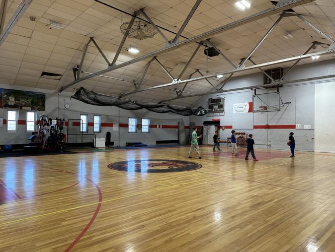 An afterschool basketball game takes place inside the Berlin Recreation Center
