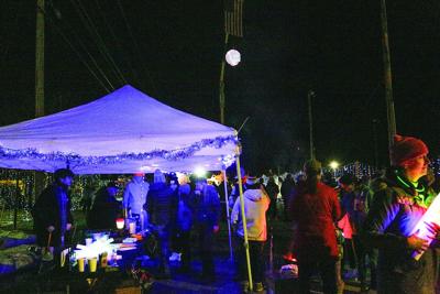 12-31-24 NYE Night of Lights ball over tents purple