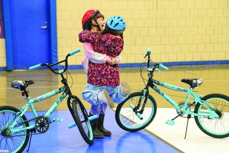 11-18-25 Josiah Bartlett Bikes pair hug