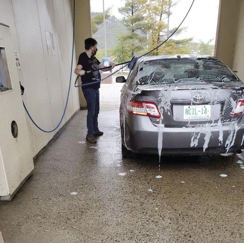 Sean washing car