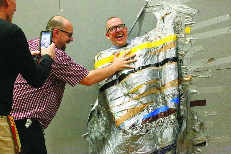 05-02-24 Duct-Taping Principal falling off wall