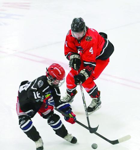 03-23-26 Battle Badges Hockey above crossed