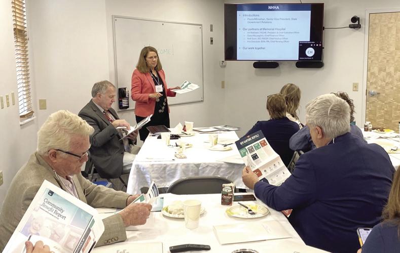 Paula Minnehan presents at hospital legislative breakfast.jpg