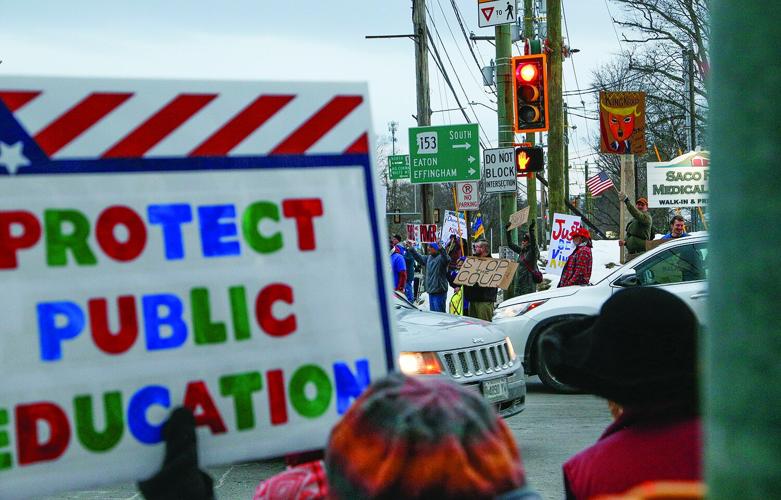 03-04-25 Trump Protest sign with traffic