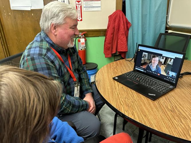 BES teacher John Paine, BES student Gavin Braley