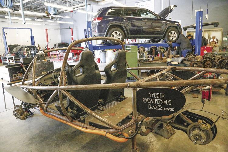 09-20-23 WMCC at KHS ev and car on lift