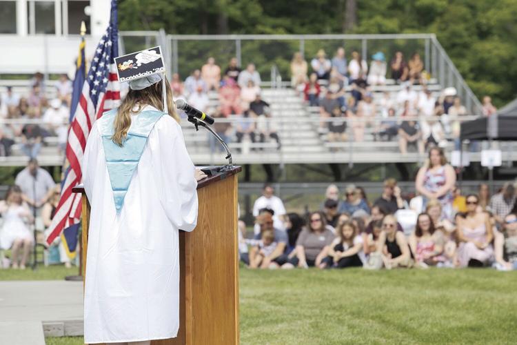 06-11-22 KHS Graduation speaker bouchard behind with crowd