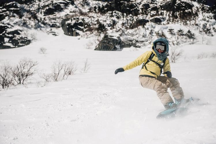 snowboarder in tuckerman ravine