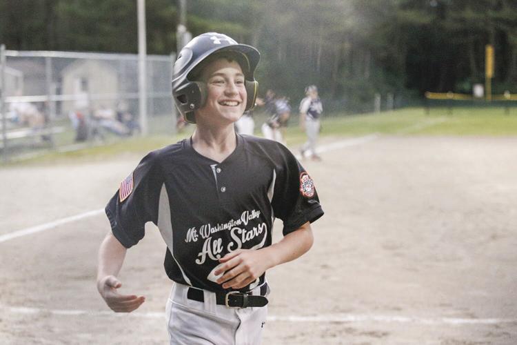 06-27-22 Cal Ripken U12 Championship tight smile after hr