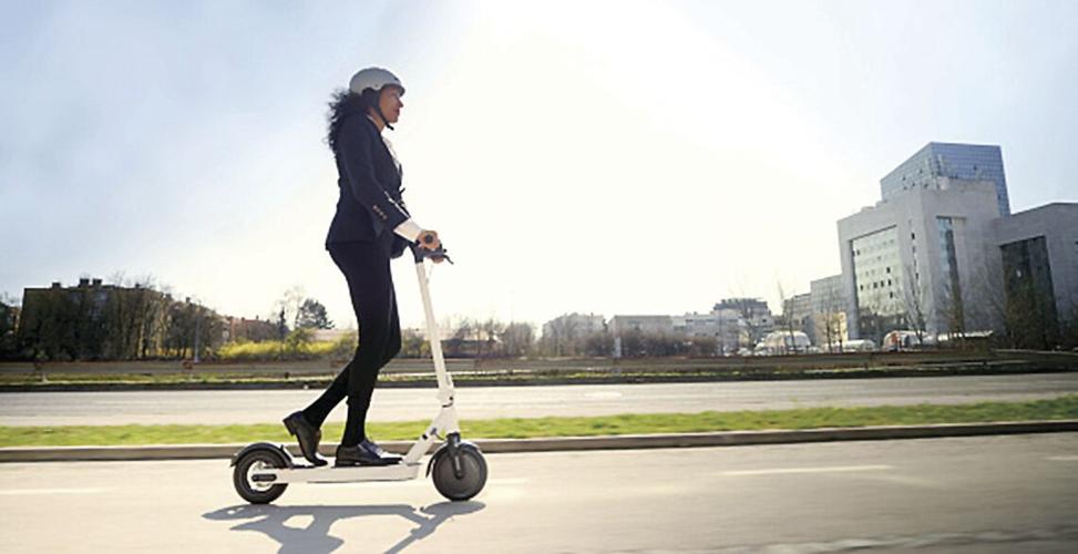 Wheel Family Fun - Riding an electric scooter