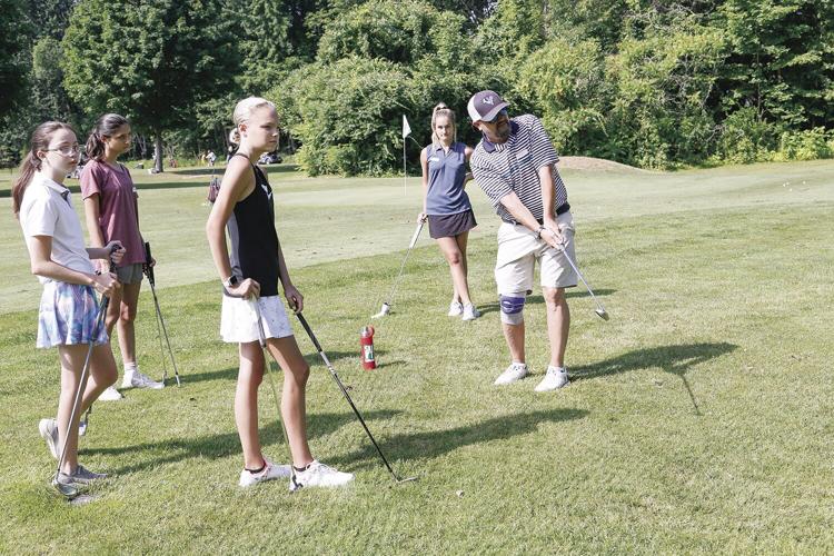 07-14-22 Junior Golf wide demonstrating chip