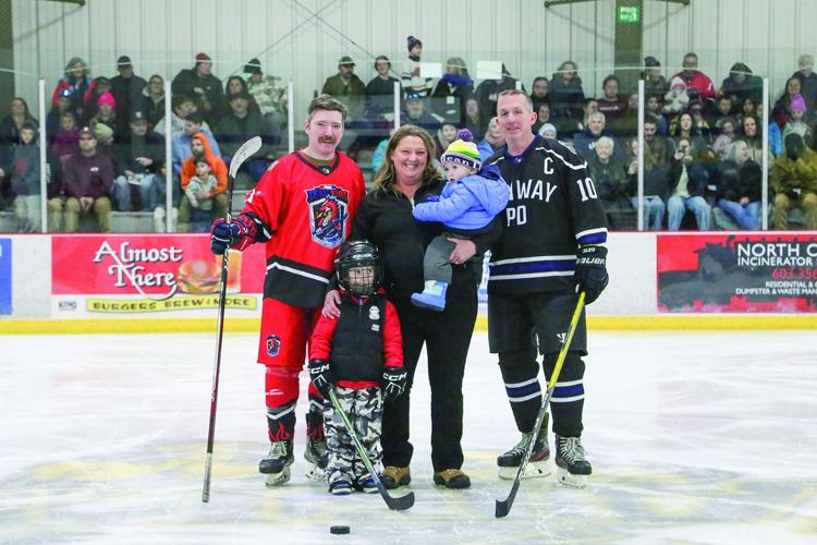 03-23-26 Battle Badges Hockey puck drop 2