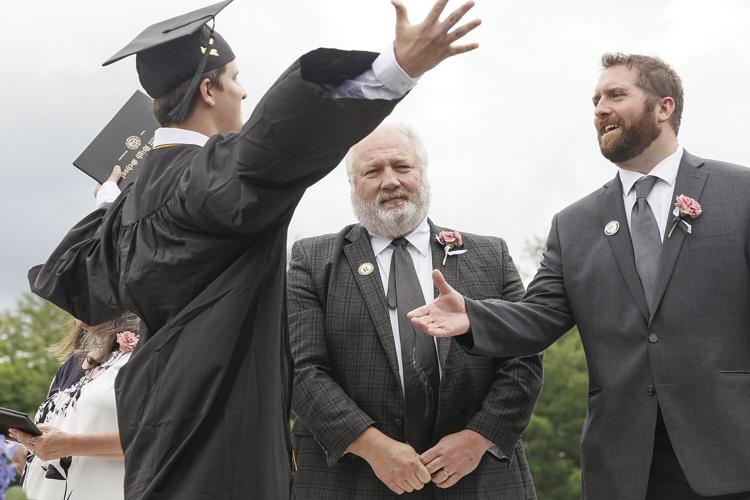 06-08-24 KHS Grad hug carpenter young 1