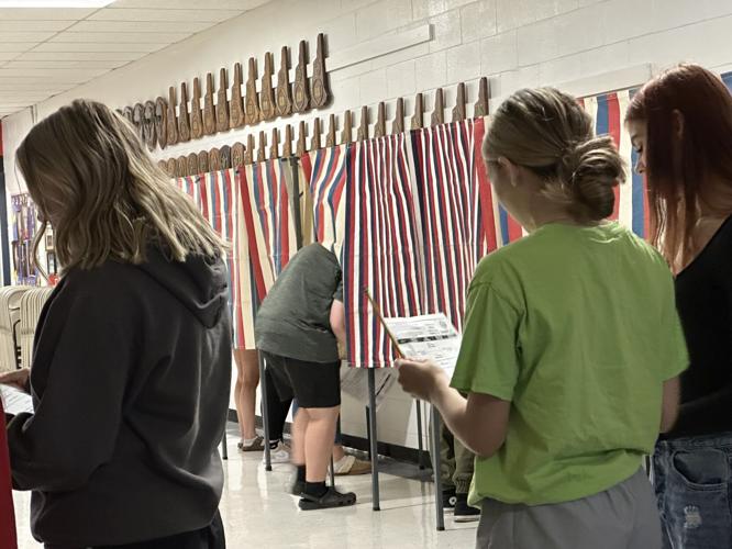 Voting in the booth
