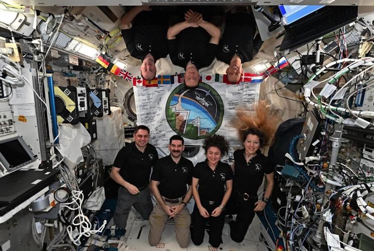 Astronauts squeeze five into ISS cupola as three new crew arrive