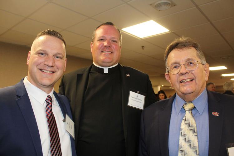 Berlin Mayor Robert Cone, Rev. Kyle Stanton of Good Shepherd Parish, Paul Grenier