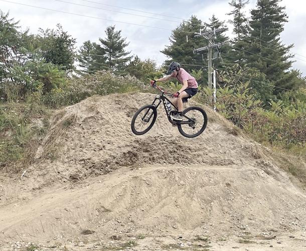 Wheel Fun - Mountain biker in the air