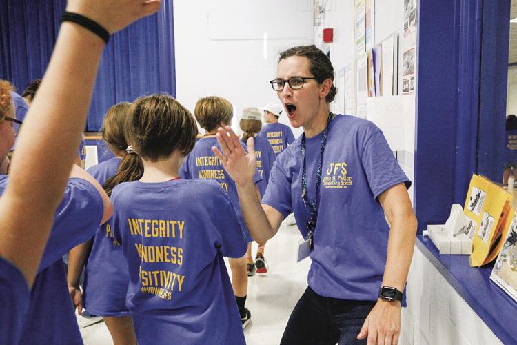 09-02-22 JFS Assembly teacher cheering