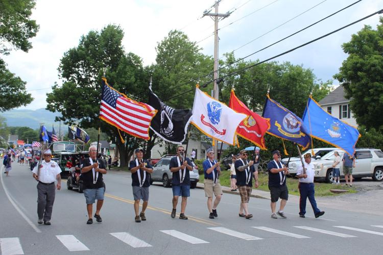 A color guard honors military servicemen and women and veterans at the July 4 parade