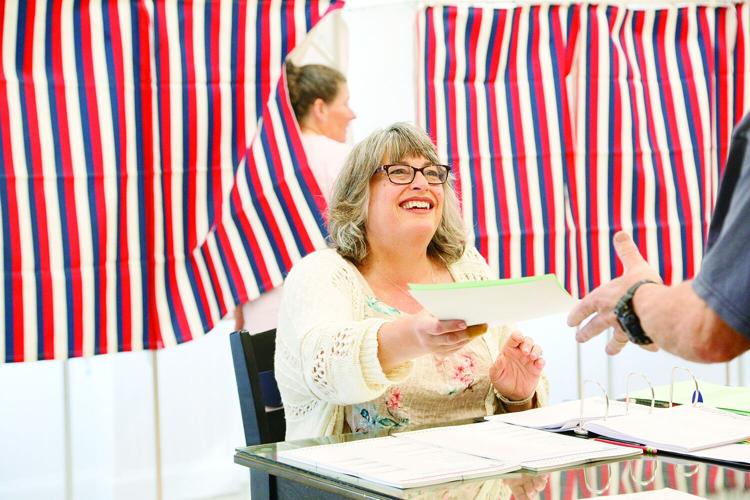 06-11-24 Fryeburg Voting handing ballot best