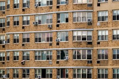 Many U.S. apartments have individual heating and cooling systems that are less efficient than current technology.