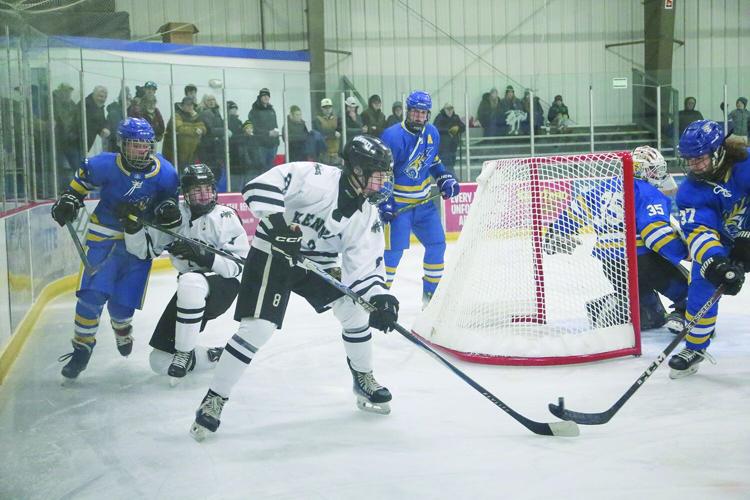 12-27-25 KHS-Maine Hockey lundblad behind net 2