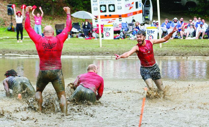 09-07-25 Mud Bowl celebrating interception wide