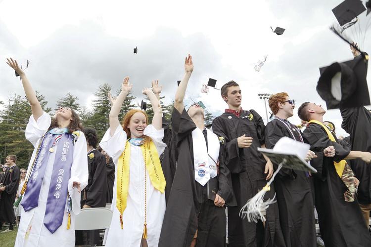 06-08-24 KHS Grad tossing caps 2