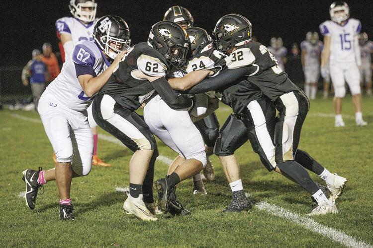 10-27-23 KHS FB trio tackle