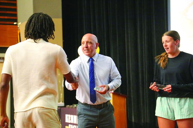 06-08-26 KHS Sports Awards mark butler handshake