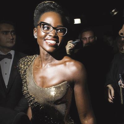 Lupita Nyong'o (center) backstage at the Oscars
