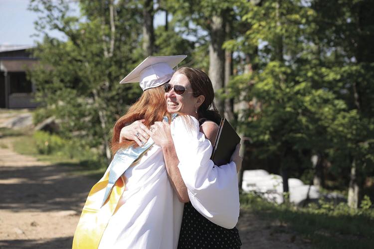 06-13-21 KHS Graduation hug Chandler and Reidy