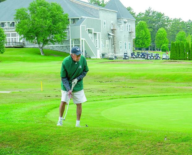 The Golf Column - White Mountain Seniors - Chuck Elliott lines up a putt