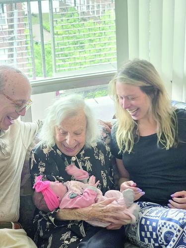 NW dd34 100 yo lady 4 w_ great grandbaby.tif