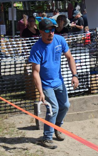 Joe Bickford of Berlin competes in the horseshoe contest
