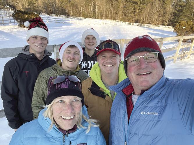 Love in the Sun - Nancy and Rob Clark with the boys Christmas Card 2021