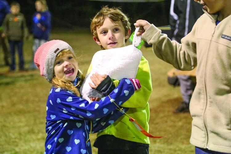 11-24-25 Conway Rec Turkey Trot raffle winner siblings trio